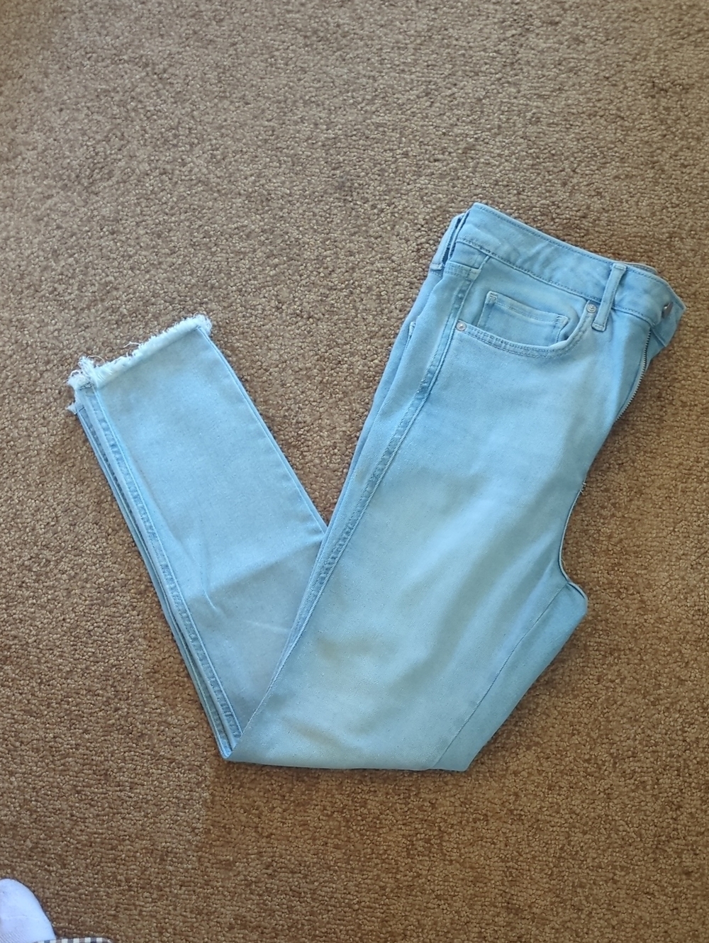 We The Free Light Blue Skinny Jeans with Frayed Ankles